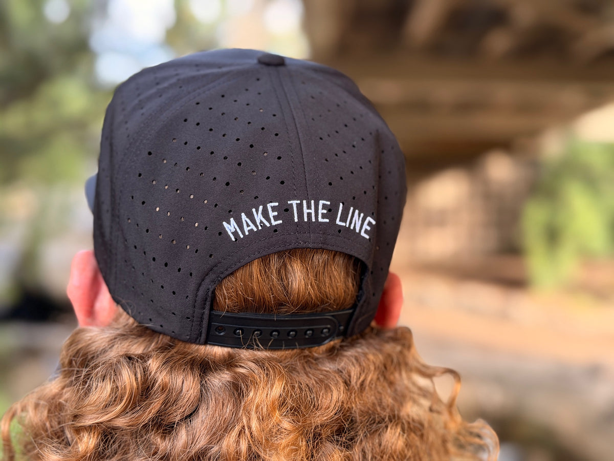 Black 7 Panel Performance Hat