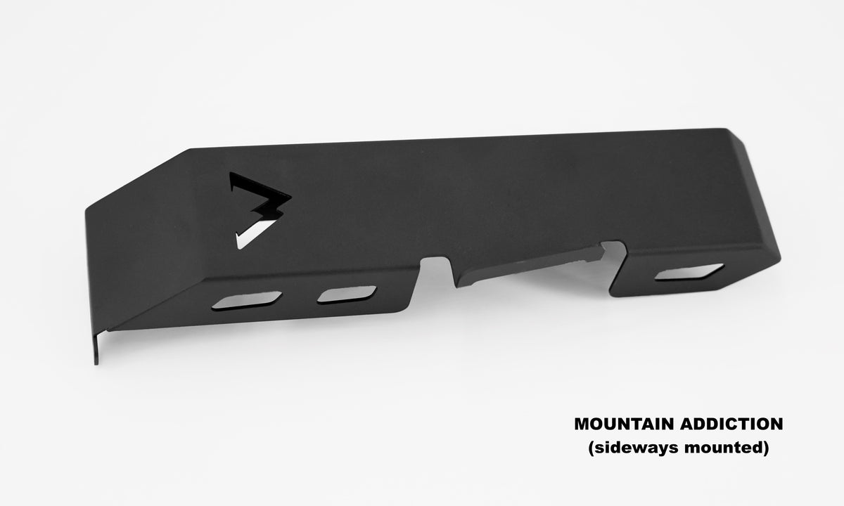 A mountain addiction sideways mounted gas jug cover sitting on a white background as a product photo 