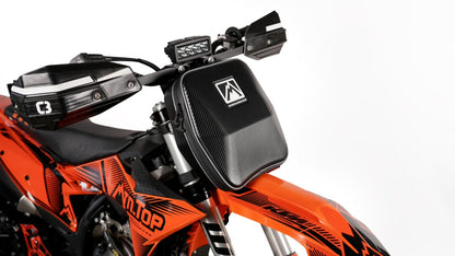 MTN.TOP Number Plate Bag mounted on the front of a snowbike